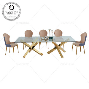 Dining table with golden stainless steel base餐桌椅
