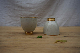 白色陶瓷铜底品茗杯